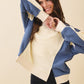 Blue and cream color-block bomber jacket with ribbed cuffs