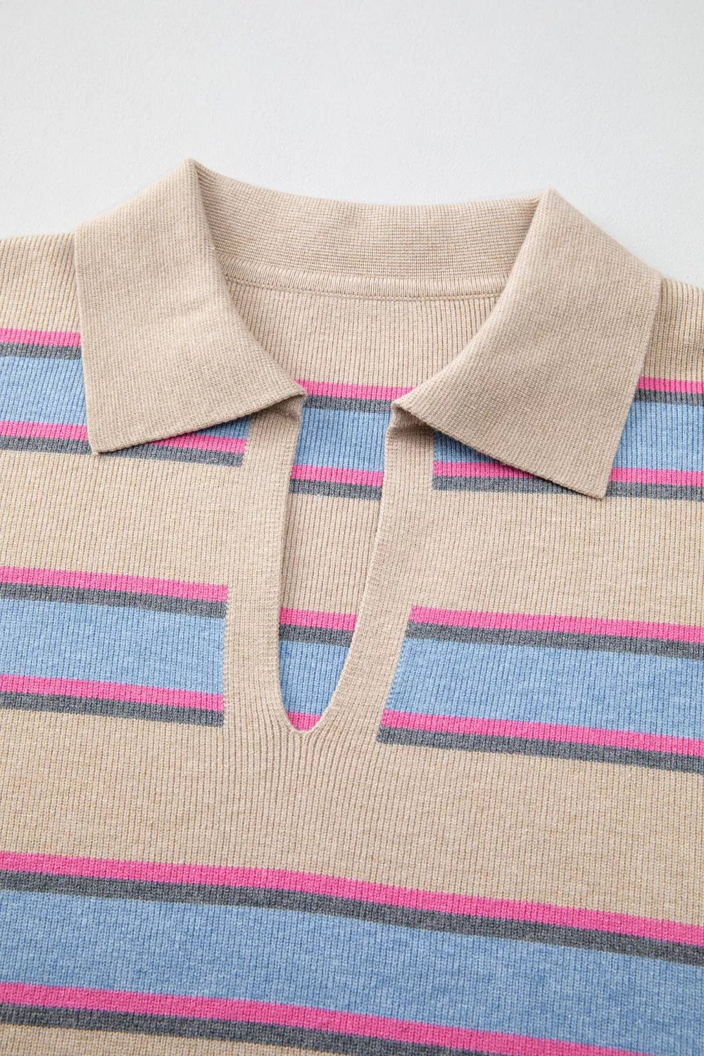 Beige striped polo shirt with pink blue accents knit sweater