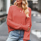 Coral ribbed-knit round neck drop shoulder long sleeve sweater