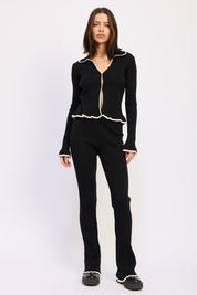 BLACK FLARED KNIT PANT WITH LETTUCE HEM | Daverri Fashions