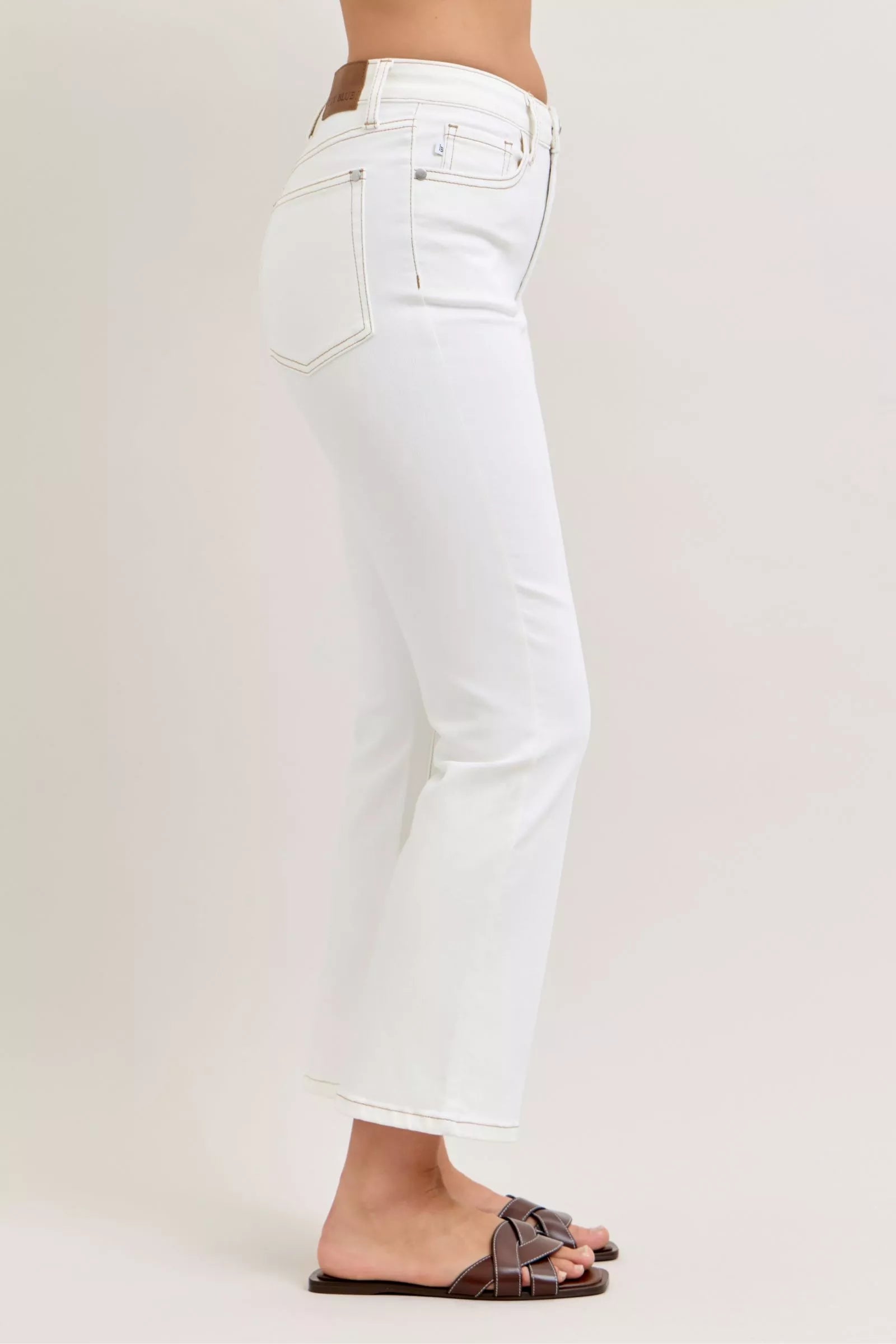 Judy Blue cropped flare jeans back with white denim straight-leg and brown leather belt loop