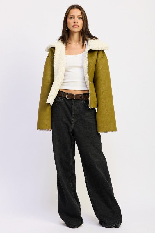 Olive green reversible suede shearling jacket with white fur collar