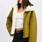Reversible suede shearling jacket in olive green with plush white lining