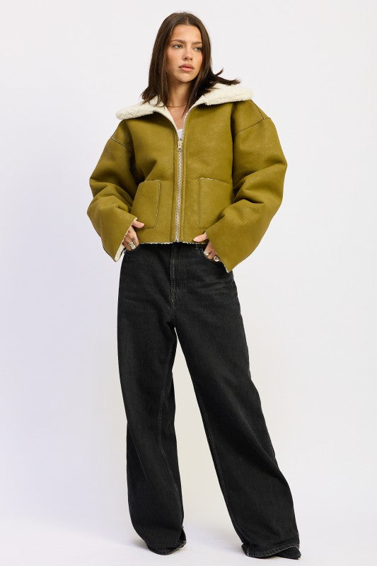 Reversible suede shearling olive green bomber jacket with fur-trimmed hood