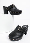 Black leather mule sandals with gold studs and silver buckle