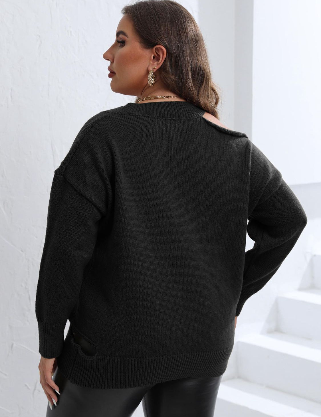 Black plus size cutout V-neck sweater with back button detail