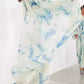 Light blue and white floral bohemian maxi dress with balloon sleeves