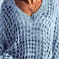 Light blue open-knit crochet top with V-neck and loose sleeves