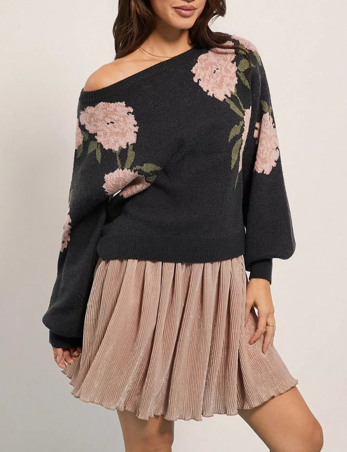 Black floral off-the-shoulder boat neck sweater with pleated skirt