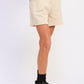 Beige French terry drawstring shorts with pockets and frayed hem