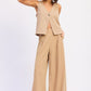 Emory Park beige sleeveless v-neck vest with wide-leg linen pants