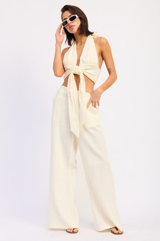 Cream-colored Double Gauze Halter Neck Crop Top with knot and wide-leg pants