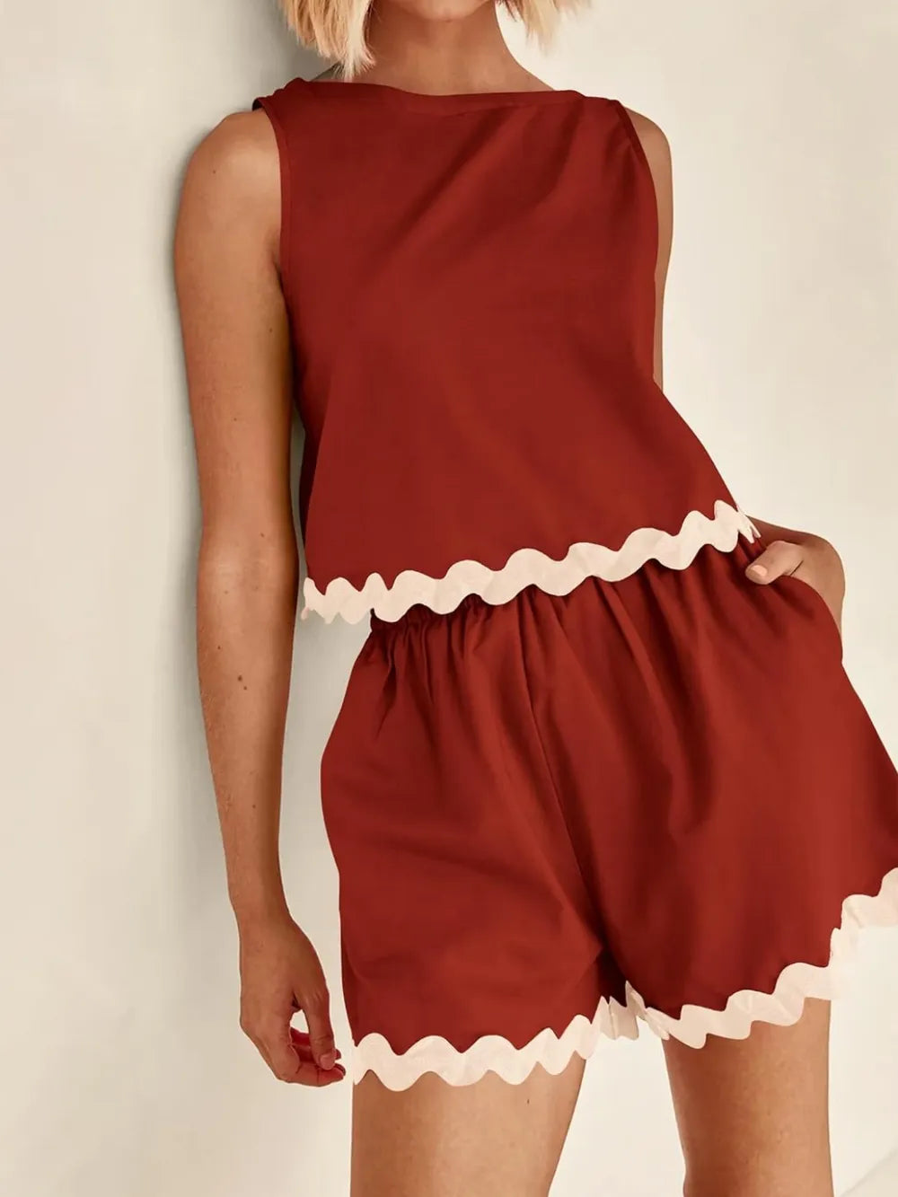 Daverri Fashions women’s rust sleeveless top and shorts set with white scallop trim