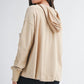 Beige relaxed pocket hoodie pullover top with oversized fit and ribbed cuffs