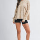Beige oversized relaxed pocket hoodie pullover with drawstring hood and ruched sleeves