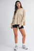 Beige oversized relaxed pocket hoodie pullover with drawstring hood and ruched sleeves