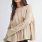 Beige oversized relaxed pocket hoodie pullover with drawstring hood and ruched sleeves