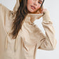 Beige relaxed pocket hoodie pullover top with front pocket and drawstrings