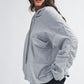 Gray relaxed fit oversized hoodie with ruched sleeves and pockets