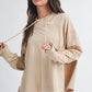 Beige oversized relaxed pocket hoodie pullover with drawstring hood and long sleeves