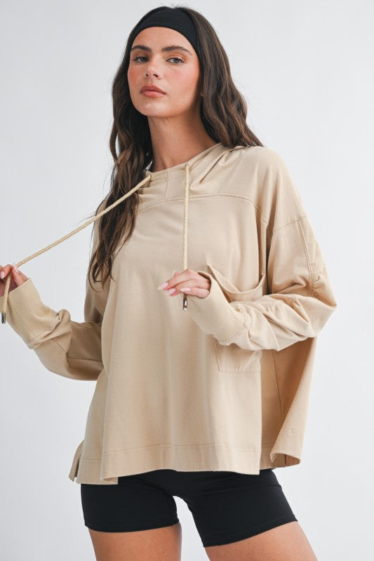 Beige oversized relaxed pocket hoodie pullover with drawstring hood and long sleeves