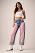 Junior low rise vinyl croc panels cuffed straight jeans back view
