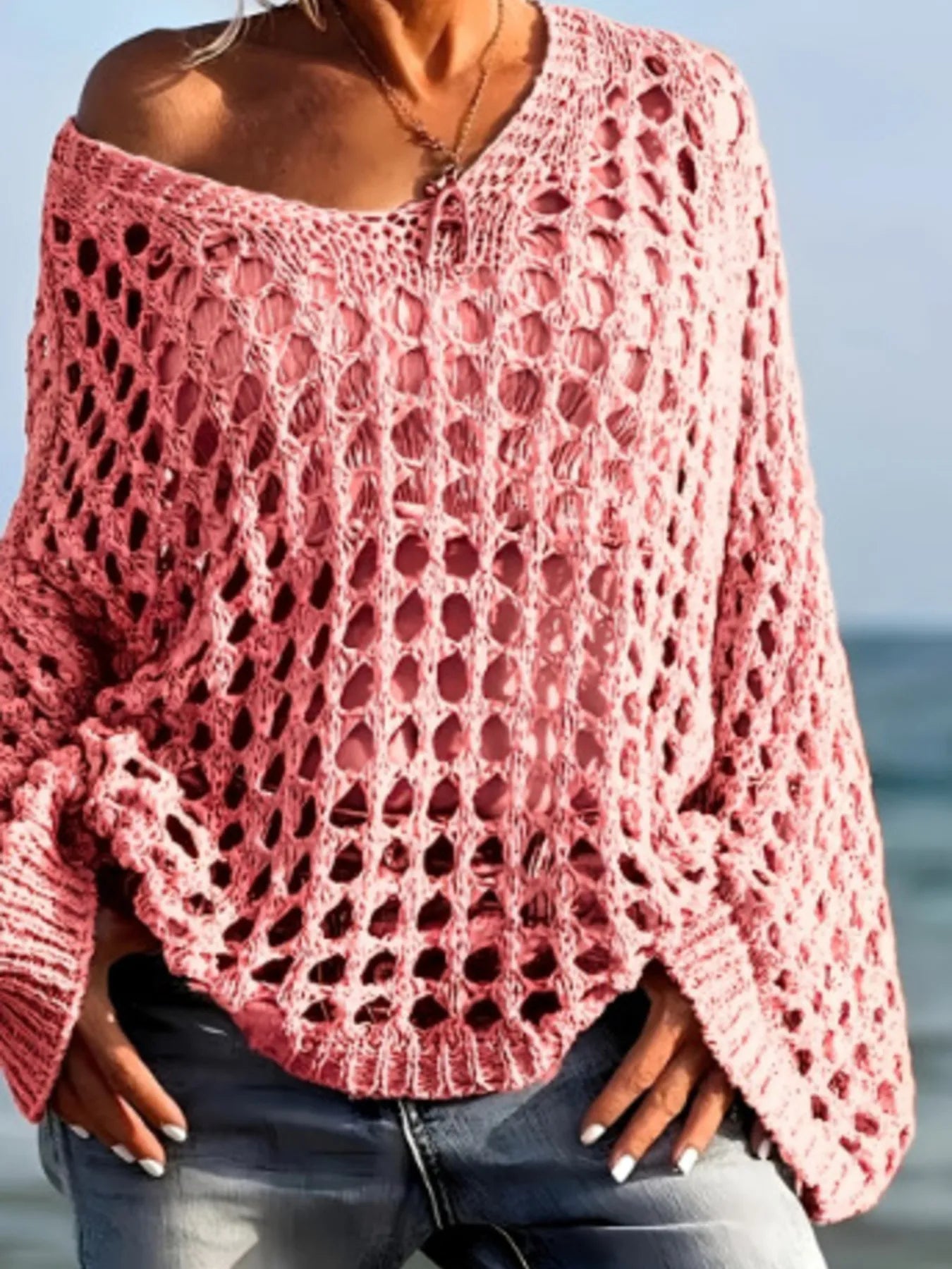 Soft pink off-shoulder crochet knit cover-up with bell sleeves