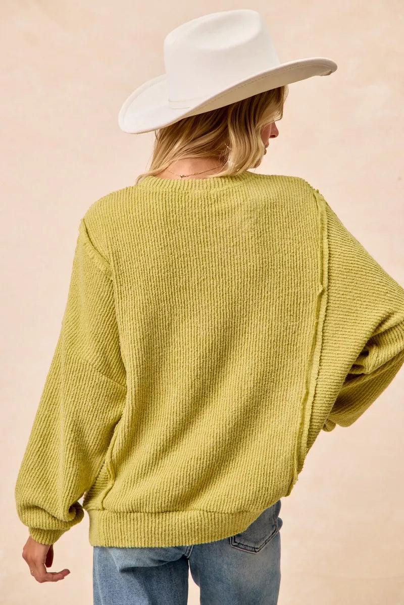 BiBi Boucle Rib Knit Uneven Hem Sweater in soft lime-green