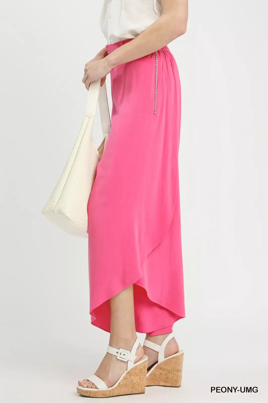 Vibrant pink Umgee flowy asymmetrical hem maxi skirt with chain detail