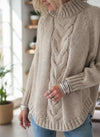 Beige full-size cable-knit turtleneck sweater with ribbed cuffs