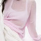 Delicate light pink boat neck dropped shoulder sweater with sheer texture and flowing sleeves
