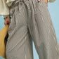 Umgee Drawstring Striped Wide-Leg Pants with black and beige stripes