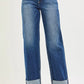 RISEN mid-rise wide straight jeans in blue denim with rolled cuffs
