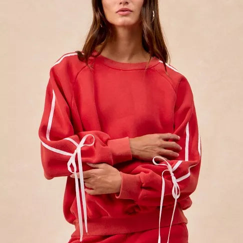Red BiBi drawstring sweatshirt with white stripes and bow lace-up details