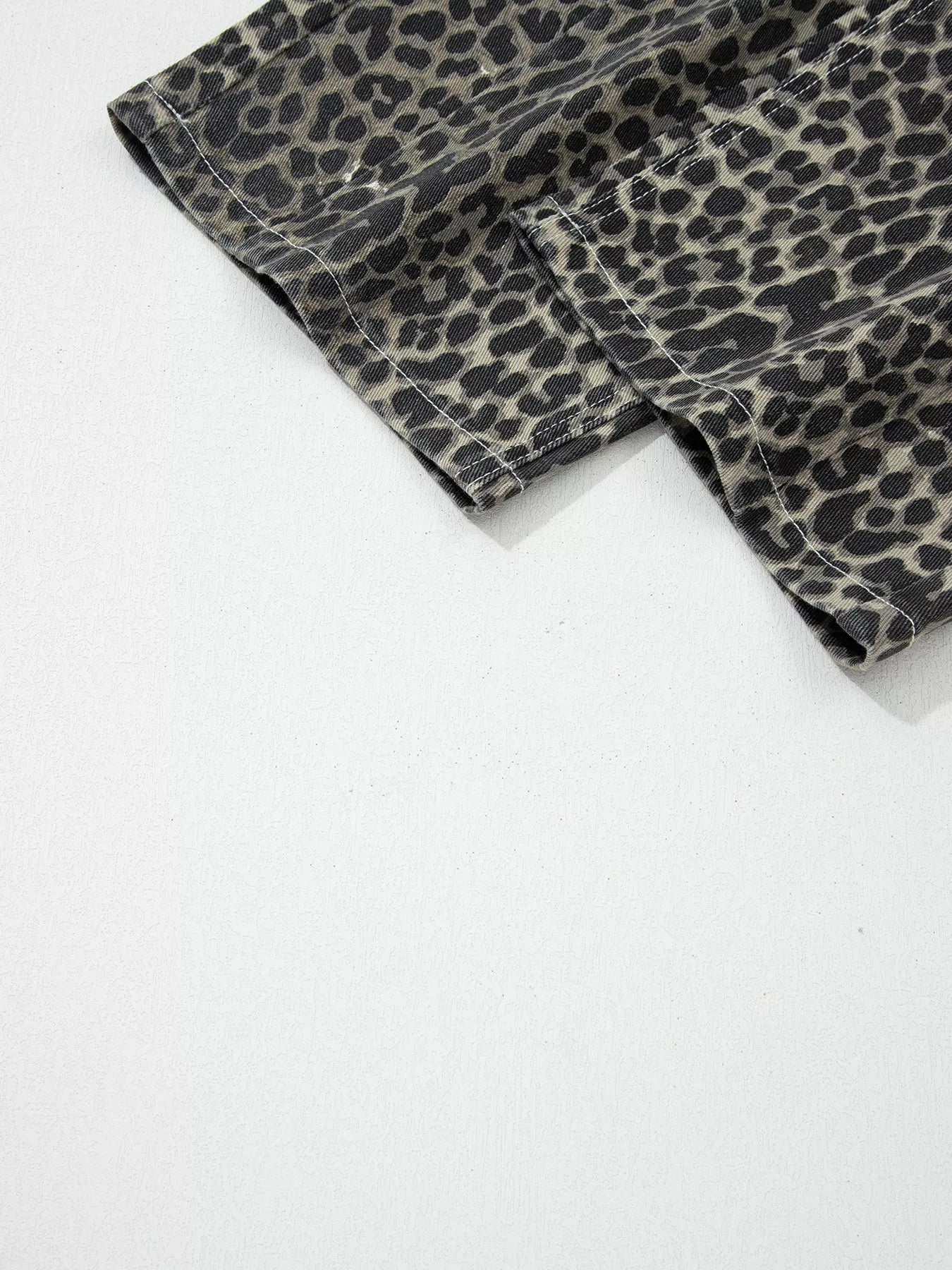 Daverri black and gray leopard print high waist distressed denim shorts