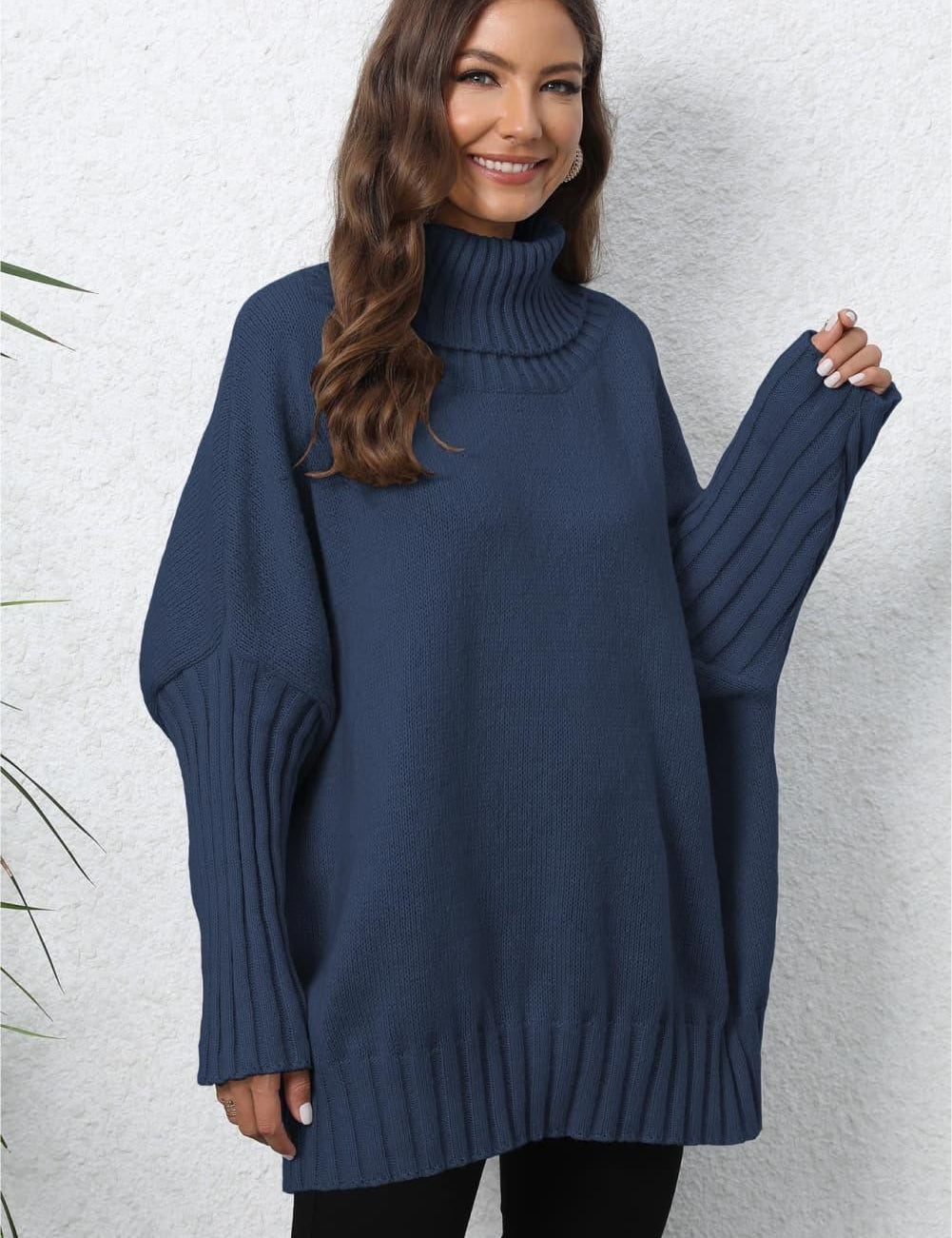 Navy blue oversized turtleneck sweater with ribbed long sleeves