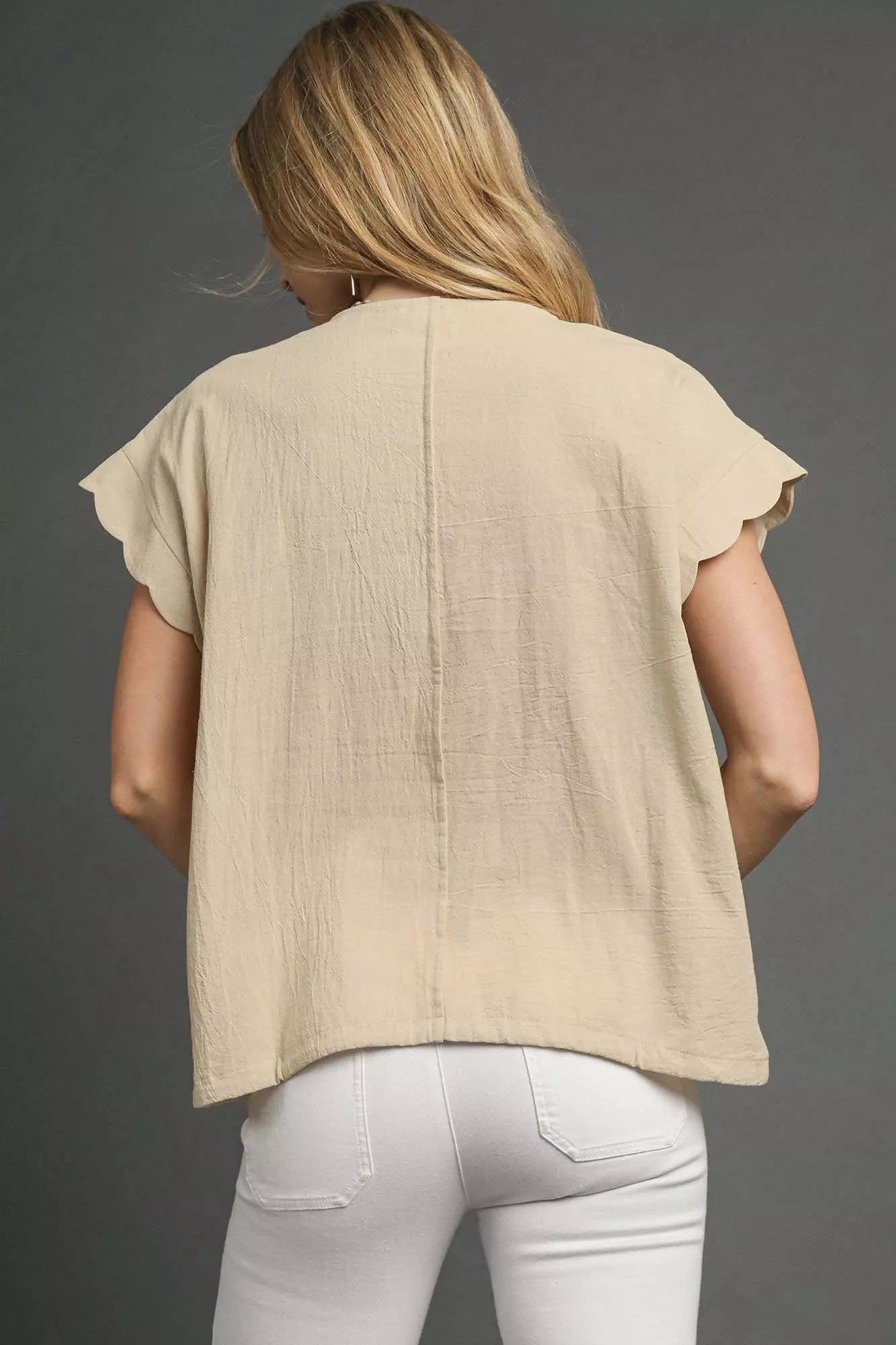 Beige textured cotton Umgee top with embroidered scallop sleeves