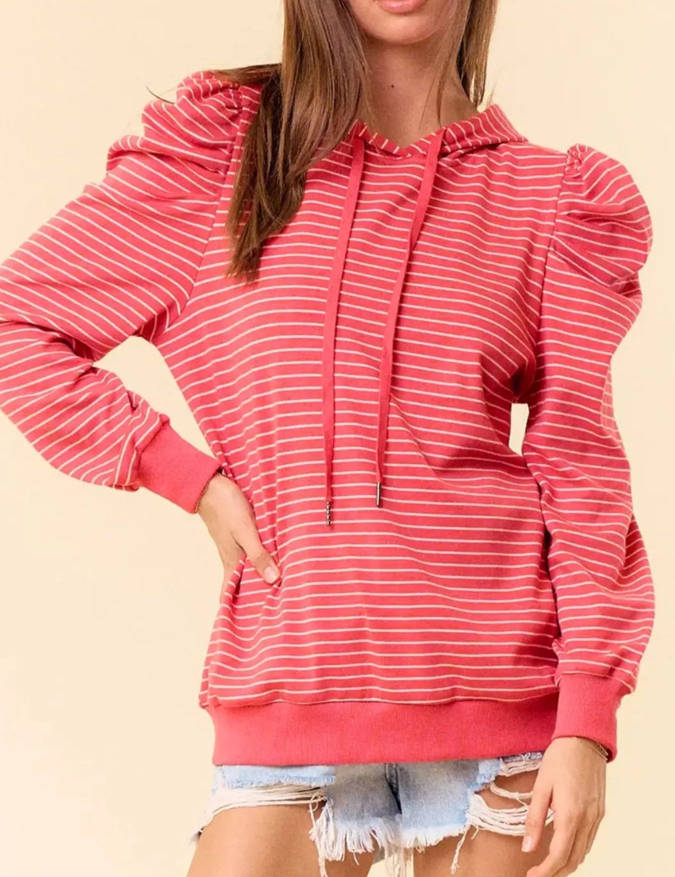 Coral striped hoodie with ruffled puff sleeves and drawstring hood