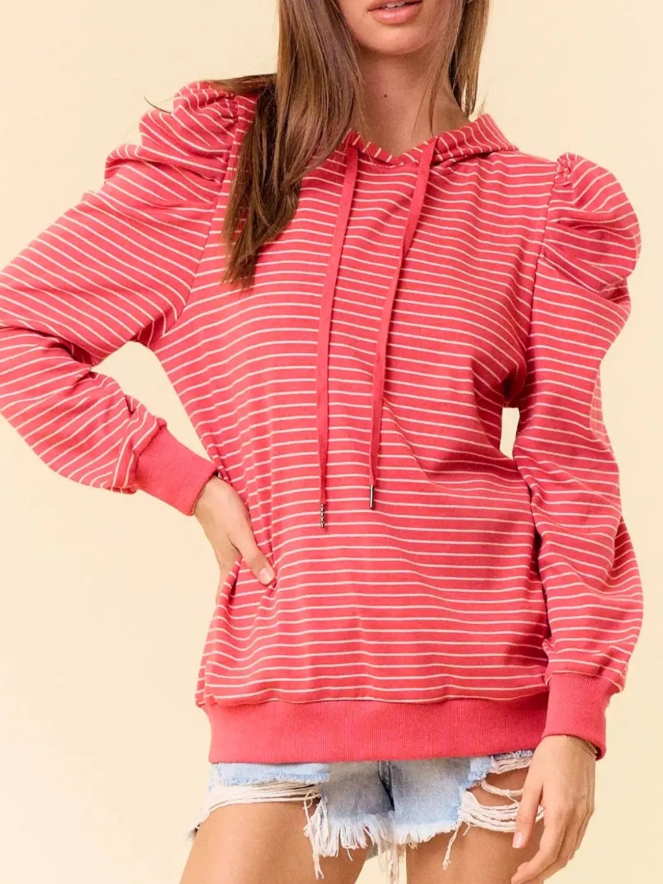Coral striped hoodie with ruffled puff sleeves and drawstring hood