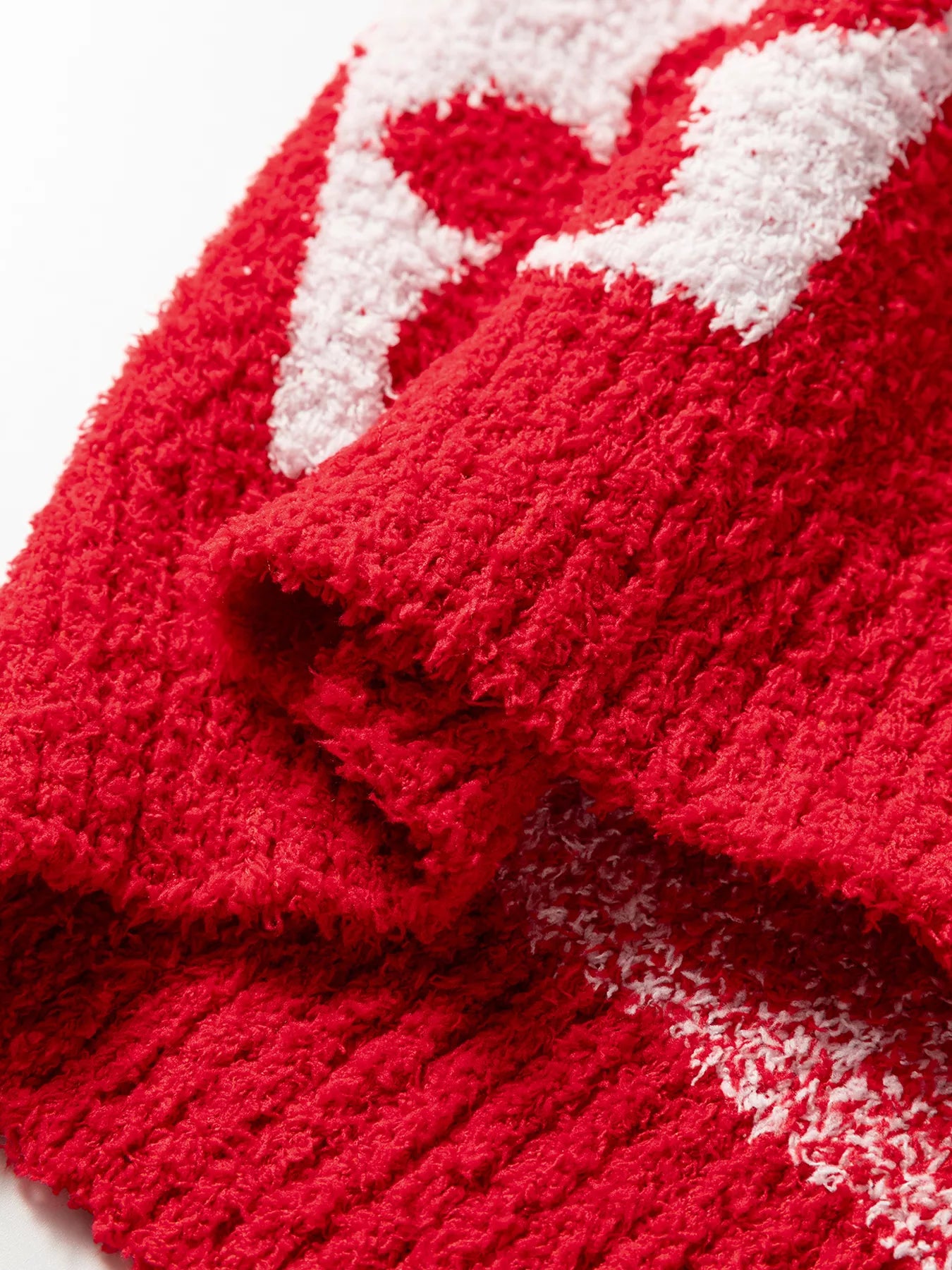 Red and white fuzzy Daverri floral heart checkered V-neck sweater