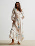 Floral print long sleeve maxi dress with smocked waist and pastel embroidery