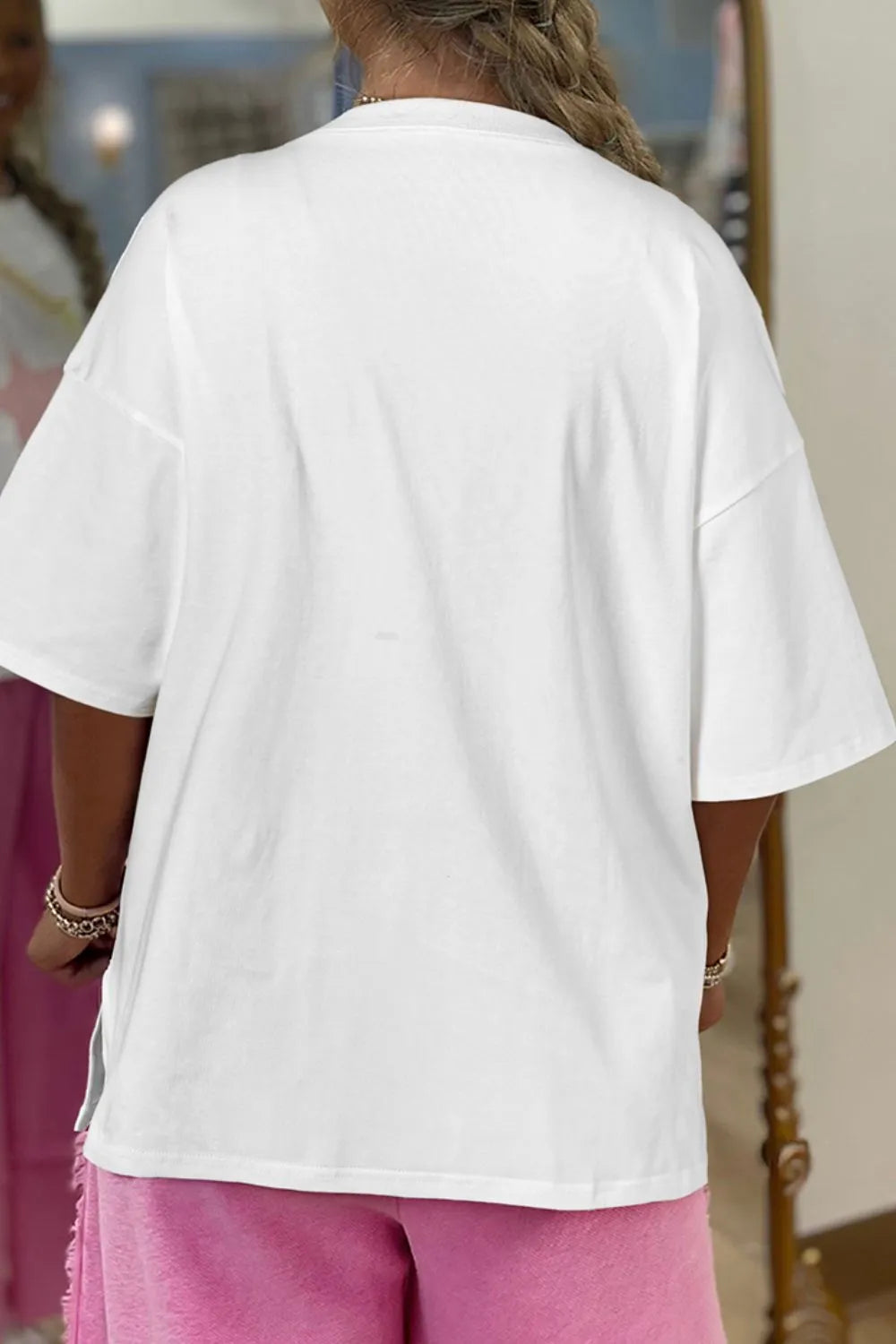 White oversized cotton drop shoulder half sleeve loose tee with star layered patched graphic