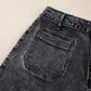 High-waisted wide leg washed jeans in dark gray denim with distressed finish and back pocket stitching