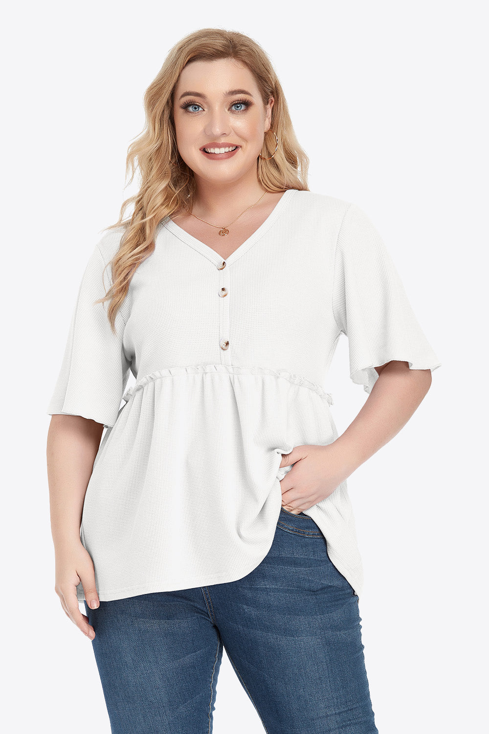 Plus size cream V-neck babydoll blouse with ruffled hem and buttons