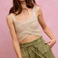 Beige crocheted crop top with cross-front on SO ME twill shorts