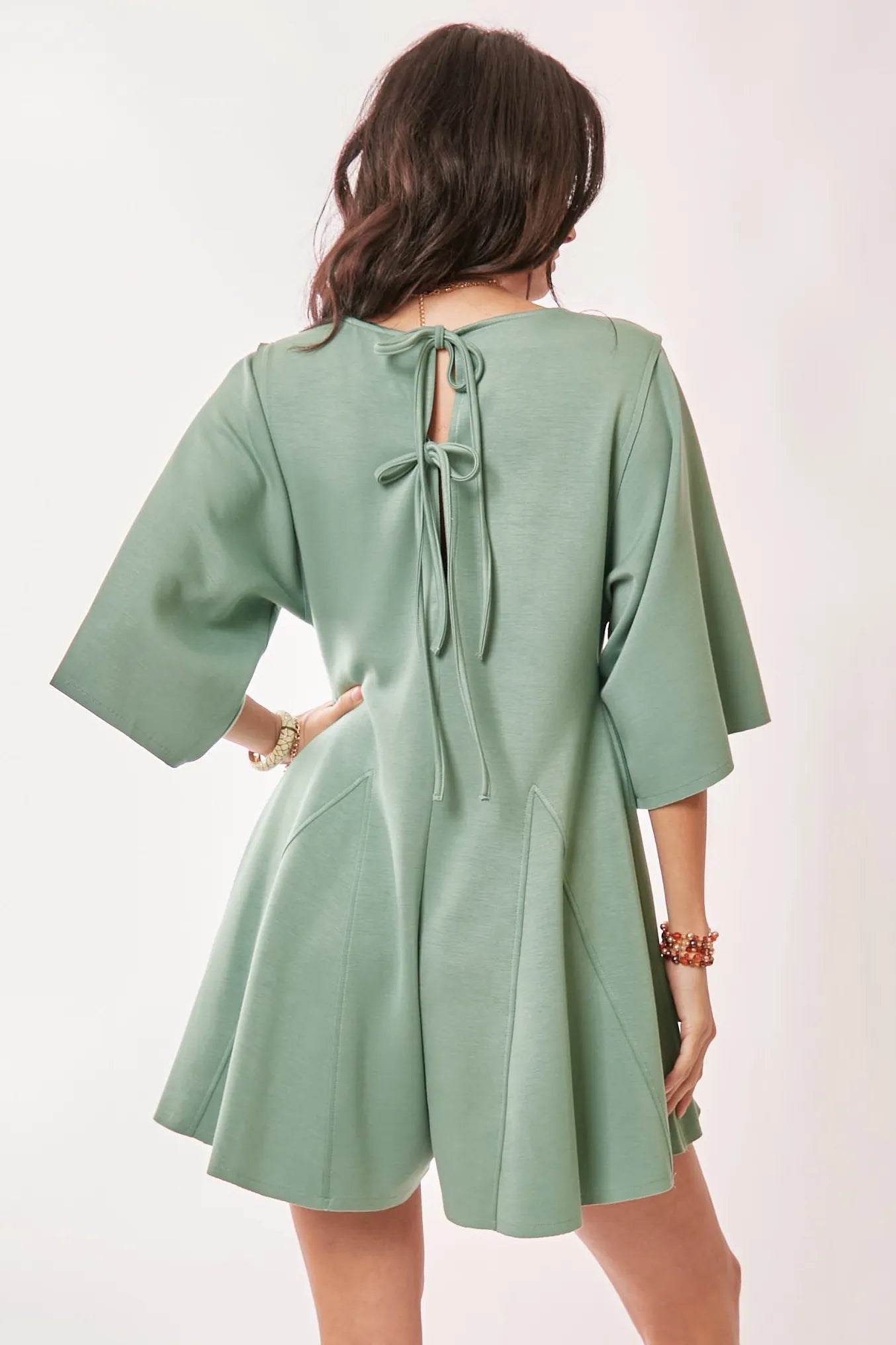 Davi & Dani Solid Draped Sleeve Ties Back Skort Romper Rompers