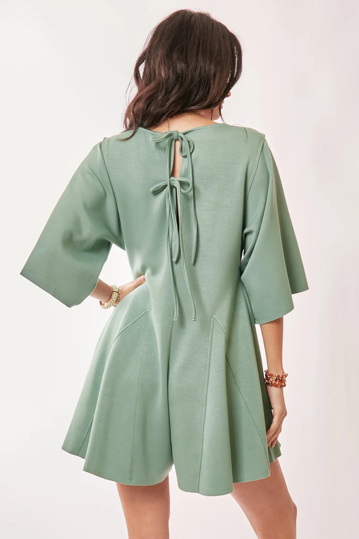 Davi & Dani Solid Draped Sleeve Ties Back Skort Romper Rompers