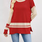 Red and cream color-blocked long-sleeve Color Block Side Slit Sweater with ribbed cuffs
