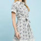 Umgee Border Print Belted Shirt Dress in cream with black floral pattern