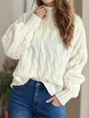 Cream cable-knit turtleneck sweater with long sleeves